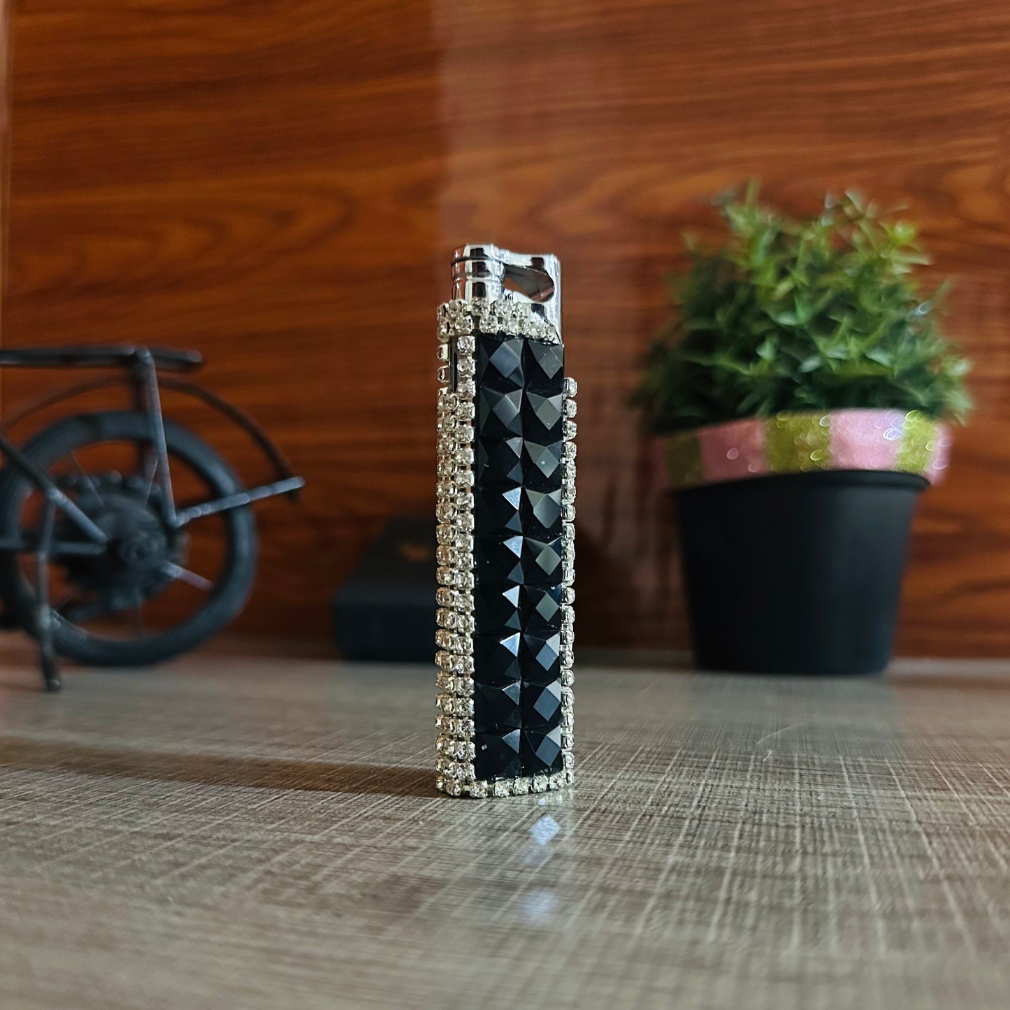 Diamond-shaped Lighter With a Red Flame