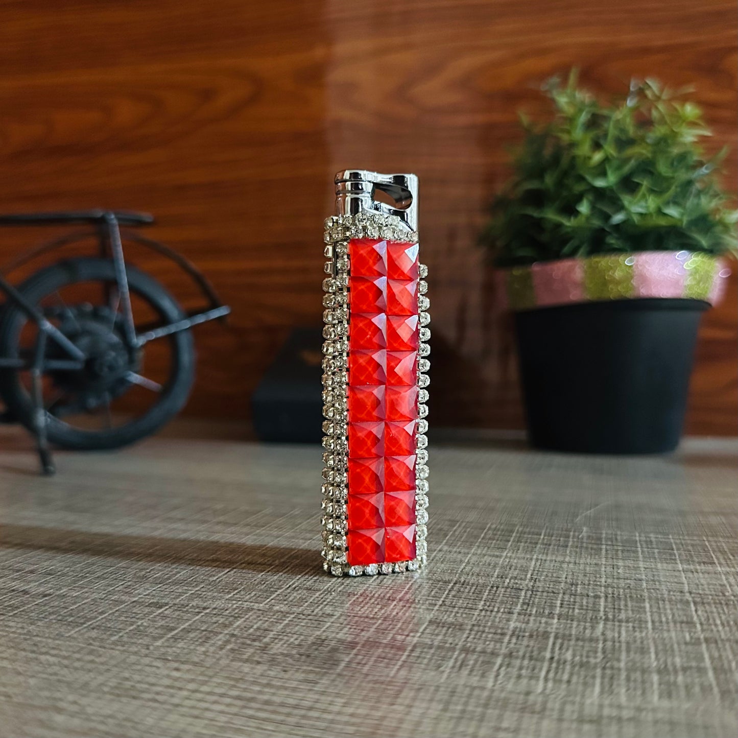 Diamond-shaped Lighter With a Red Flame