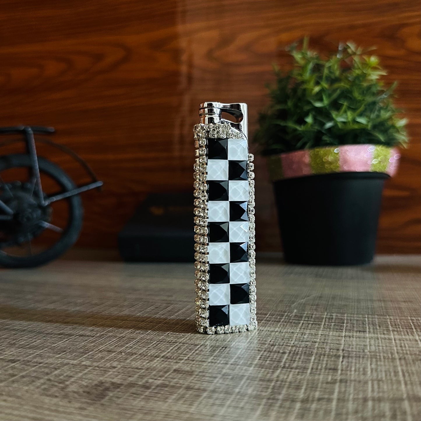 Diamond-shaped Lighter With a Red Flame